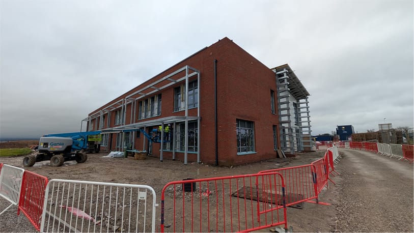 Brick education building extension at structural frame stage